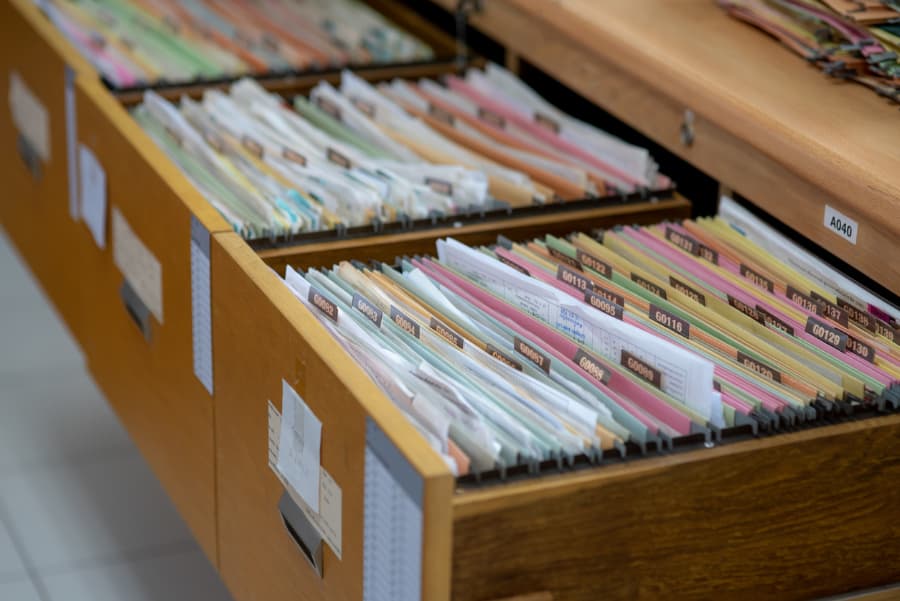 Documents Organized And Filed In Cabinets