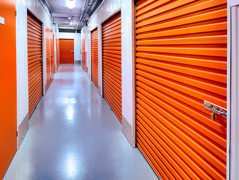 A hallway with secure self-storage units